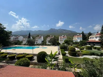 a view of a resort with a swimming pool at 3 bedroom Villa in Kyrenia, 2 minutes away from the beach! in Strovolos