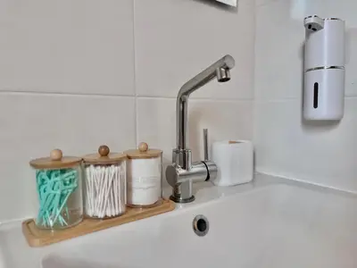 a kitchen sink with a faucet and a counter top at Monte Napa Moments in Ayia Napa