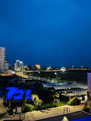 a view of a city at night at Sea view Remus Family 2 bdr apartment in Nicosia