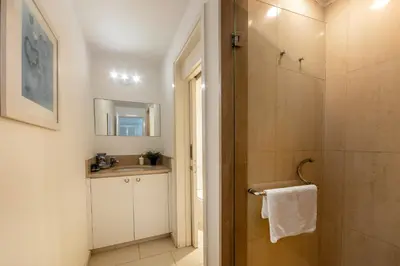 a bathroom with a shower and a sink at Protaras Seafront Villa Galene Del Mar in Protaras
