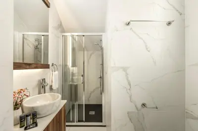 a bathroom with a sink and a shower at Protaras Sol e Mar Villa 2 in Protaras