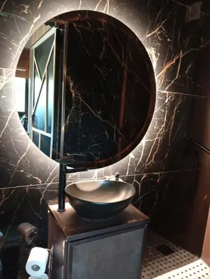 a bathroom with a sink and a mirror at Ζεν σπίτι in Limassol