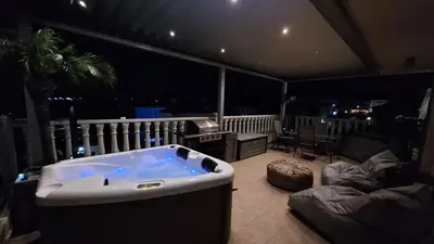a jacuzzi tub in the middle of a room at Nissi Golden Sands Paradi in Ayia Napa