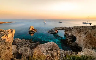 a view of the ocean with boats in the water at Corfu Hotel in Ayia Napa