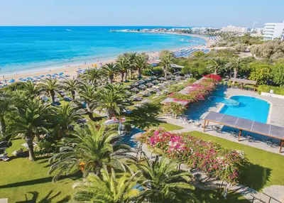 an aerial view of a resort with a beach and a swimming pool at Alion Beach Hotel in Ayia Napa