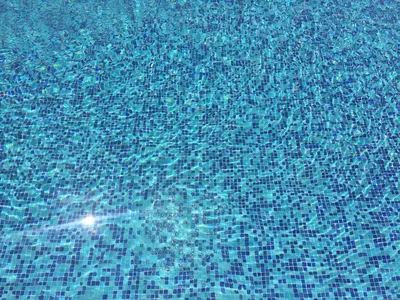 a close up of a pool of blue water at Paradise Traditional House in Maroni