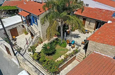an overhead view of a yard with plants and trees at Niki's House in Limassol