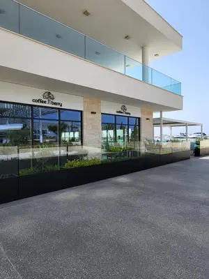 an office building with a lot of windows at Villa Gracia in Ayia Napa