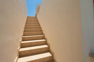 a stairway in a building with a stair case at myExclusiveVilla 683 in Protaras