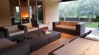a living room with a couch and a table at Agia Mavri House in Koilani