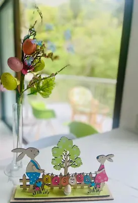 a vase with a toy train and a tree at Riverside Suite in Kalopanayiotis