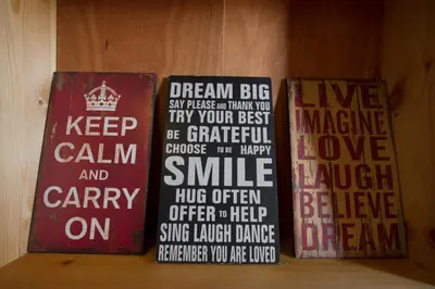 a group of signs on a wall with words at Vas' Penthouse in Nicosia