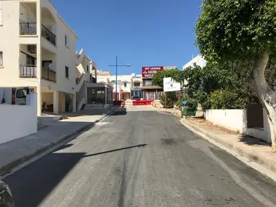 an empty street in a town with buildings at Luxury Apartment Ayia Napa Center in Ayia Napa
