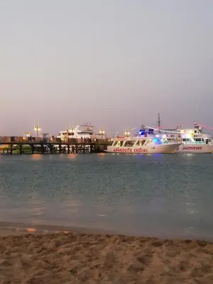 two boats docked at a dock in the water at Villa Sotmarie in Protaras
