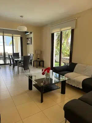 a living room with a couch and a table at Villa Sotmarie in Protaras