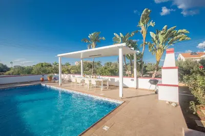 a villa with a swimming pool and a gazebo at Villa Orka in Protaras