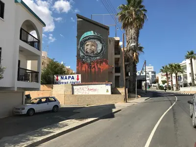 a car parked on the side of a street with a mural at Luxury Studio Ayia Napa Center in Ayia Napa