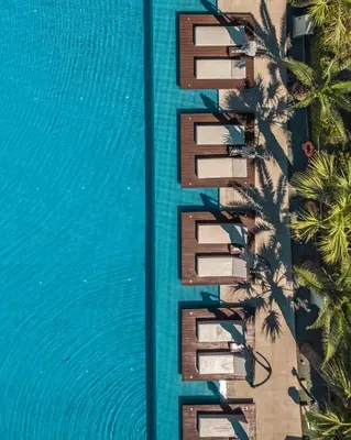 an overhead view of a building next to a pool at Nestor Hotel in Ayia Napa