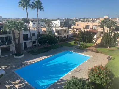an overhead view of a swimming pool in a apartment at Theodoros Apt. 408 in Protaras