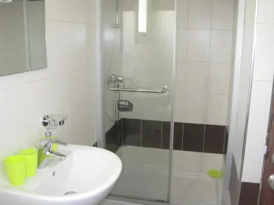a bathroom with a sink and a shower at Polyxenia Isaak Villa Heaven Pernera in Protaras