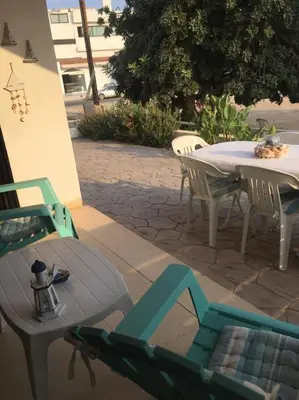 a patio with a table and chairs and a table and a table and chairs at Annita Court Block B, Apt6 in Ayia Napa