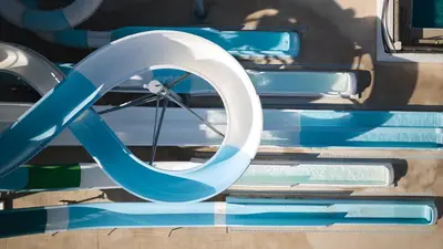 a close up of a blue and white bike tire at Maris Grand Waterpark Resort in Protaras