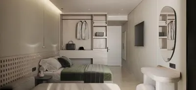 a bedroom with a bed and a sink and a mirror at Sun Palace Protaras Waterpark Resort in Protaras