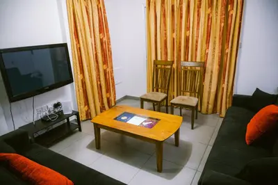 a living room with a couch and a coffee table at Villa Costa Cornelia Homes in Ayia Napa