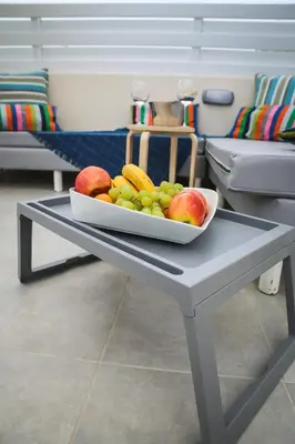 a bowl of fruit on a table in a living room at Villa Elena in Ayia Napa