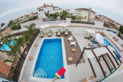 an overhead view of a swimming pool at a resort at Villa Elena in Ayia Napa