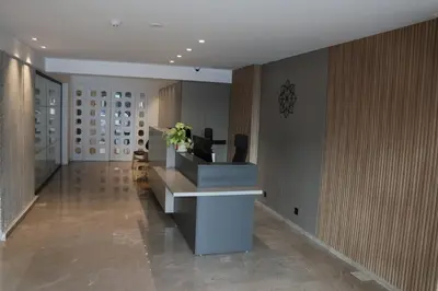a lobby with a reception desk in a building at Sunflower Hotel Apartments in Larnaka