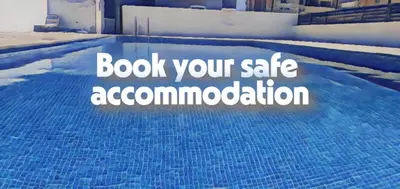 a blue swimming pool with the words book your sale accommodation at Vasilas Holiday Apartment #1 in Larnaka