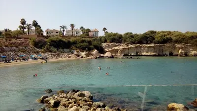 a group of people in the water at a beach at Villa Garmar CTO Approved 4487 in Paralimni