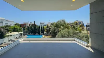 a view of a swimming pool from the balcony of a house at Vivo Mare 3 Bedroom Villas in Ayia Napa
