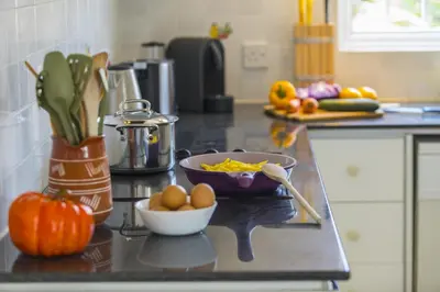 a kitchen counter with a bowl of eggs and vegetables at Villa Serene in Ayia Napa
