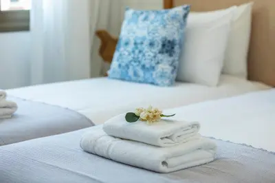 a pile of towels sitting on top of a bed at Chris Le Mare Luxury Villa in Protaras