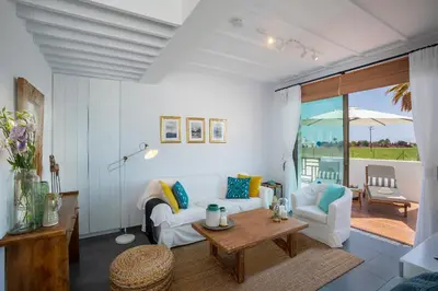 a living room with a white couch and a table at Chris Le Mare Luxury Villa in Protaras