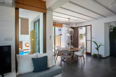 a dining room with a table and chairs at Chris Le Mare Luxury Villa in Protaras