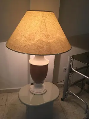 a lamp sitting on a table with a lamp on it at Artemis House in Limassol