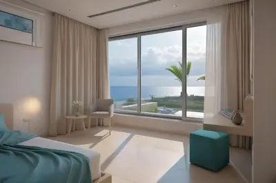a bedroom with a bed and a large window at Beachfront Luxury Villa Glory in Ayia Napa