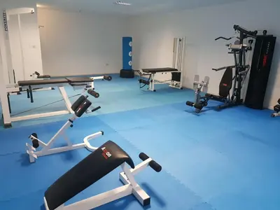 a gym with several exercise bikes and treadmills at Evabelle Napa Hotel Apartments in Ayia Napa