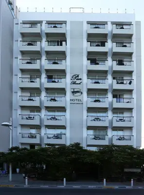a white apartment building with balconies on it at Pier Beach Hotel Apartments in Limassol