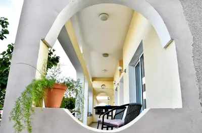 an internal courtyard of a house with a circular window at Lucky 4 in Paralimni