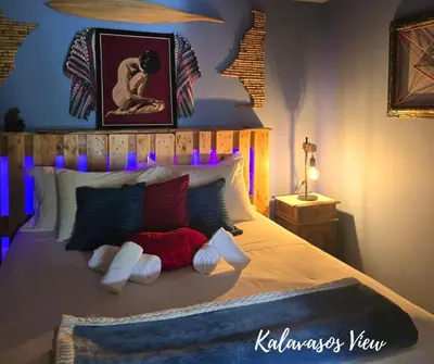 a bedroom with a bed with two stuffed animals on it at Kalavasos View Traditional Apartments in Kalavasos