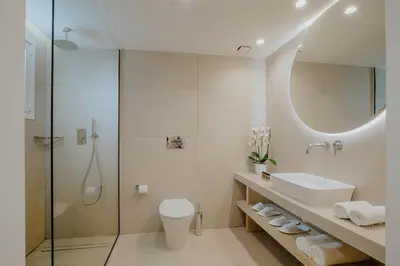 a bathroom with a sink toilet and a shower at Melissi Beach Hotel & Spa in Ayia Napa