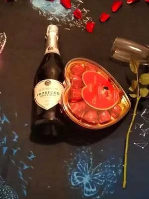 a bottle of champagne and a container of red peppers at Hermes complex1 paralimni in Paralimni