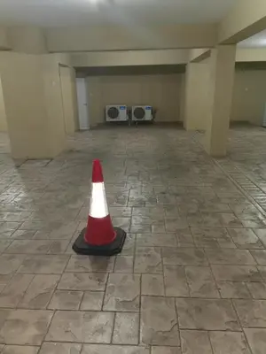 a red and white traffic cone in a room at Hermes complex1 paralimni in Paralimni