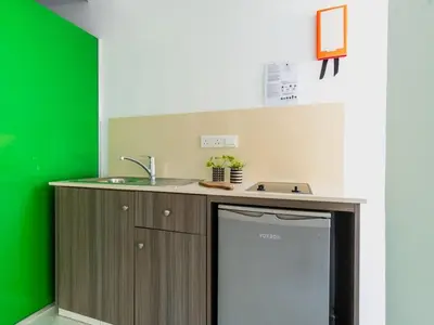 a kitchen with a counter with a sink and a dishwasher at Rio Gardens Aparthotel in Ayia Napa