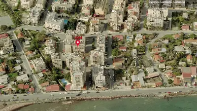 an aerial view of a city with buildings at LCA4 flat for you apartment in Larnaka