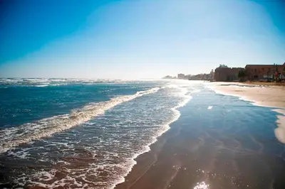 a view of a beach with the ocean at Mediterranean Sunrise Complex in Voroklini